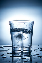 splashing clean water in a glass