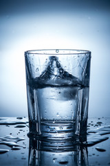 splashing clean water in a glass