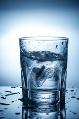 splashing clean water in a glass