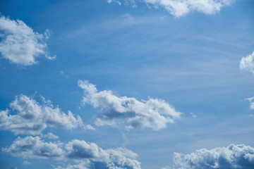 Naklejka na ściany i meble White clouds in blue sky for background