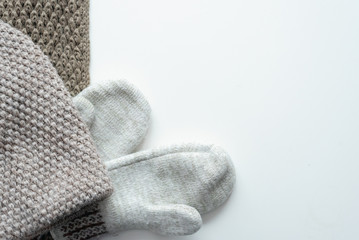 Knitted clothes flat lay background with copy space.