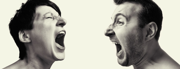 Man and woman yell at each other on white isolated background.