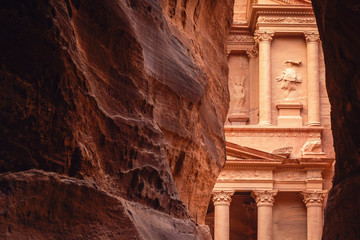 The entrance to the hidden city of Petra, with the walls of the Siq and the Treasury, Petra, Jordan