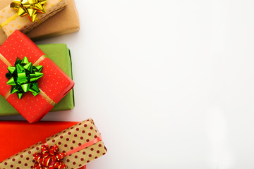 Christmas composition. Christmas gift boxes laid on white background. Flat lay, top view, copy space.
