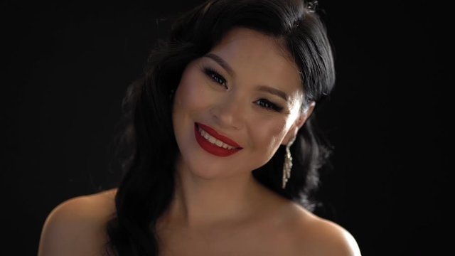 Beautiful Asian Brunette Smile And Tourch Herself In Studio