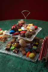 Dessert plate with assortment of sweets, piece of cake, cookies, biscuits
