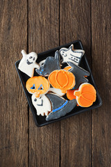 Funny delicious Halloween cookies on the table. horizontal top view