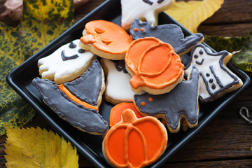 Funny delicious Halloween cookies on the table. horizontal top view