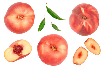 Ripe chinese flat peach fruit and half with leaf isolated on white background. Top view. Flat lay