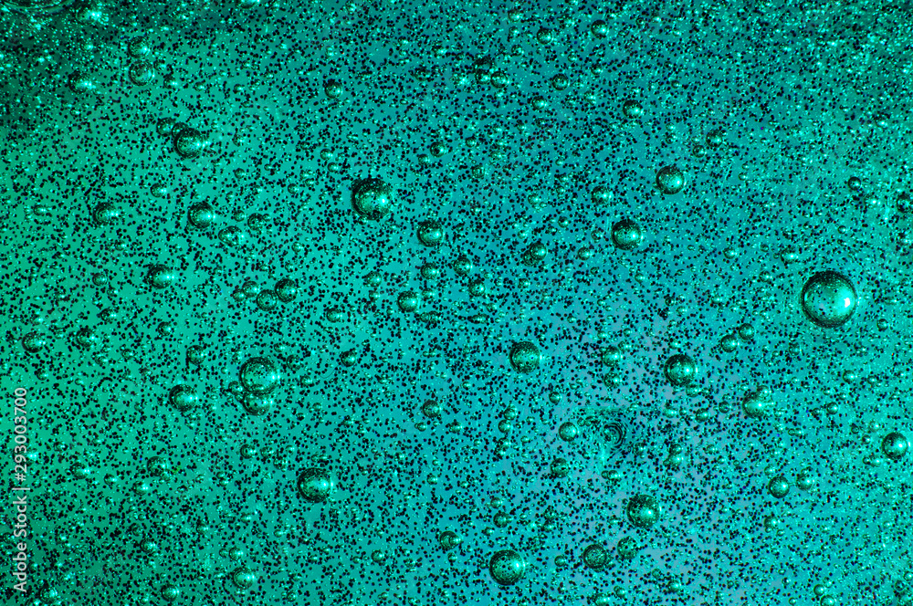 Poster Macro of mint and blue slime with glittering particles and bubbles