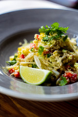 Close up of a hot nutritious tabouleh with couscous and vegetables