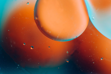 Abstract orange and blue gradient background of oil drops