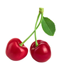 Two cherries with leaf closeup isolated on white background