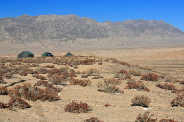 Green tents-temporary campsite-Central Altyn tagh mountains from Nnal.Highway G315-N.Xorkol basin. Xinjiang-China-0505