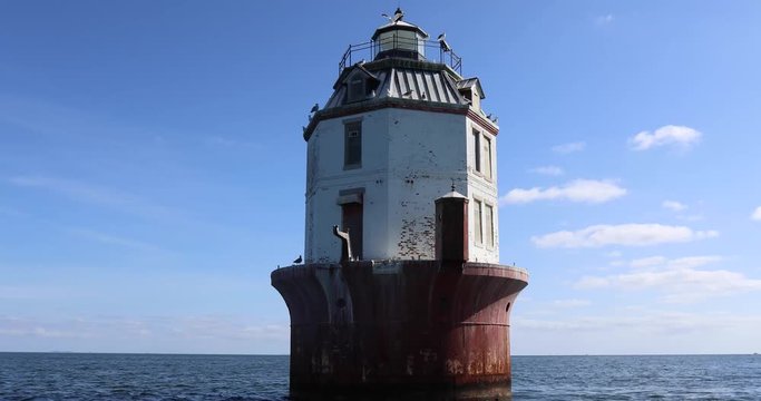 Pan around Point No Point Lighthouse in Chesapeake Bay