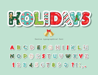 Christmas cut out decorative font. Scrapbook paper with stitching. All patterns are full under clipping mask. For posters, banners, greeting cards. Vector