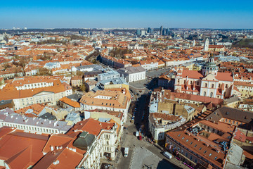 Naklejka na ściany i meble Aerial view of an old town in Vilnius , Lithuania during sunny summer morning. (high ISO image)