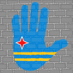 Hand painted with the flag of Aruba over a grunge brick wall - Vector