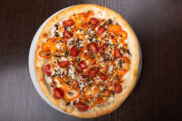 Pizza with mushrooms and vegetables and mushrooms