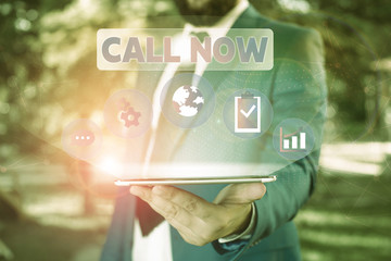 Text sign showing Call Now. Business photo showcasing To immediately contact a demonstrating using...