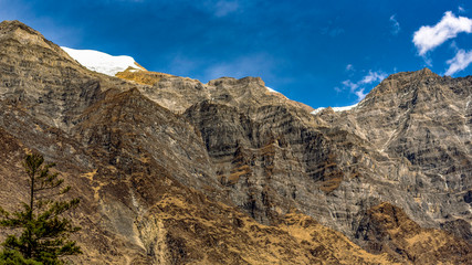 Fototapeta premium Snow covered mountain peaks in Himalayas, Nepal.