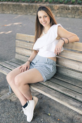 Portrait of a young entrepreneur influencer at the park in Bergamo, Italy