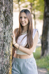 Portrait of a young entrepreneur influencer at the park in Bergamo, Italy