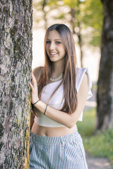 Portrait of a young entrepreneur influencer at the park in Bergamo, Italy