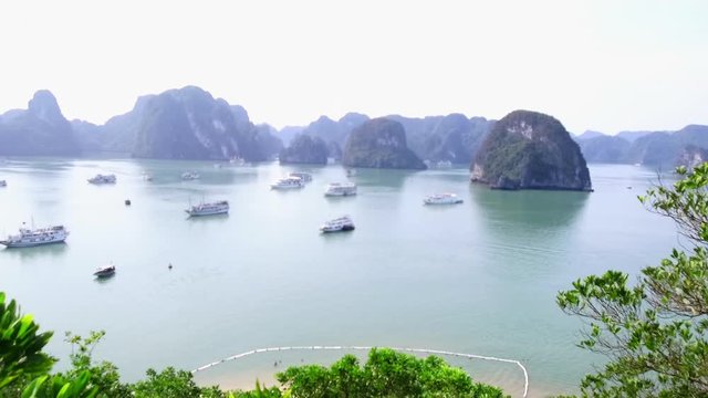 Wide Angle: Woman Looking Out to the Boats on the Water of Halong Bay