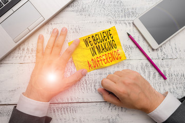 Handwriting text writing We Believe In Making A Difference. Conceptual photo selfconfidence that...