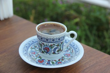 Small beautiful cup with patterns, turkish coffee