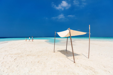 Mother and kids at tropical beach
