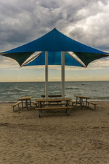Public beach shelter and benches at Pickering waterfront, Ontario, Canada