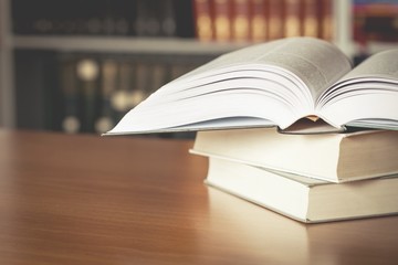 Collection of old books  on background