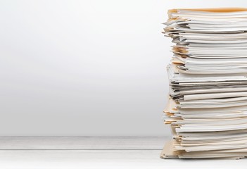 Stack of papers isolated on white background