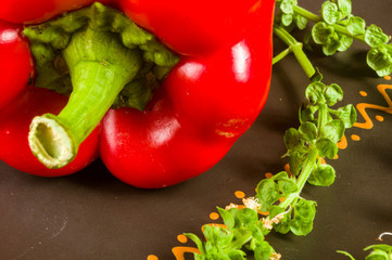 a freshest red paprika, bell pepper in ceramic plate