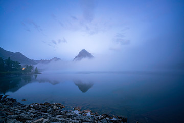 Sunrise of the Mount Wilbur, Swiftcurrent Lake in the Many Glacier area of the famous Glacier...