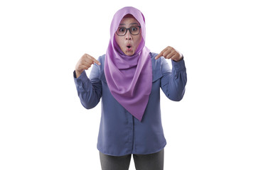 Fototapeta premium Muslim Woman Surprised and Pointing Down