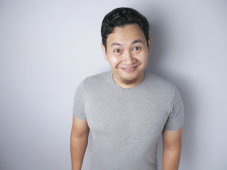 Obraz premium Funny Asian Man Smiling