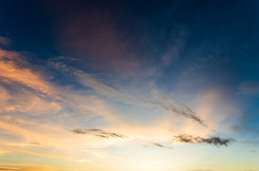 colorful dramatic sky with cloud at sunset.