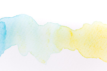 Abstract handmade watercolor.It is wet texture background with paint brushes on the white paper. Picture for design art work.