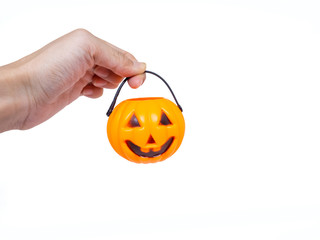 hand holding Jack'O pumpkin basket , Halloween pumpkin baskets on white background