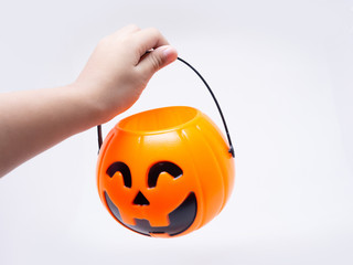  Kid's hand holding Jack'O pumpkin basket , Halloween pumpkin baskets on white background