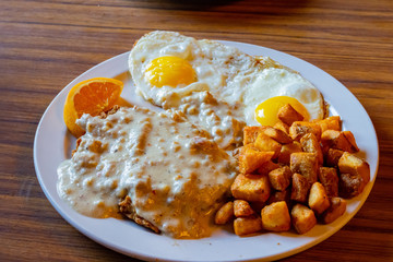 Close up shot of fried steak with sauce