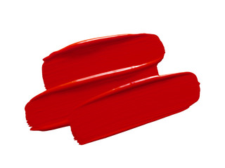 Liquid lipstick smear smudge swatch isolated on white background. Red lip product brushstrokes....