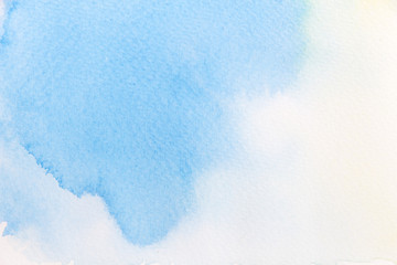Abstract background image from watercolor on white paper.