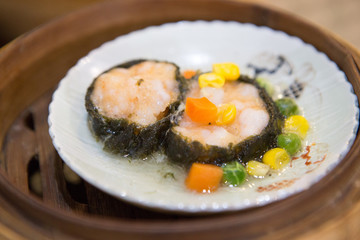 Close up of  Dim Sum in the basket in Chinese restaurant