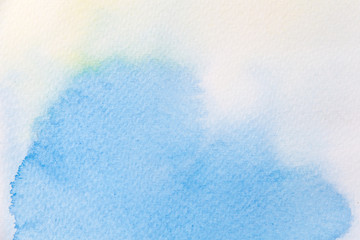 Abstract background image from watercolor on white paper.