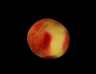peach isolated on black background