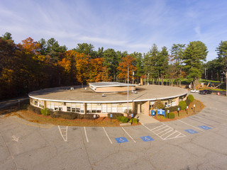 Wilmington town hall aerial view at the town center with fall foliage in Wilmington, Massachusetts, USA.